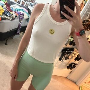 White smiley face crop top